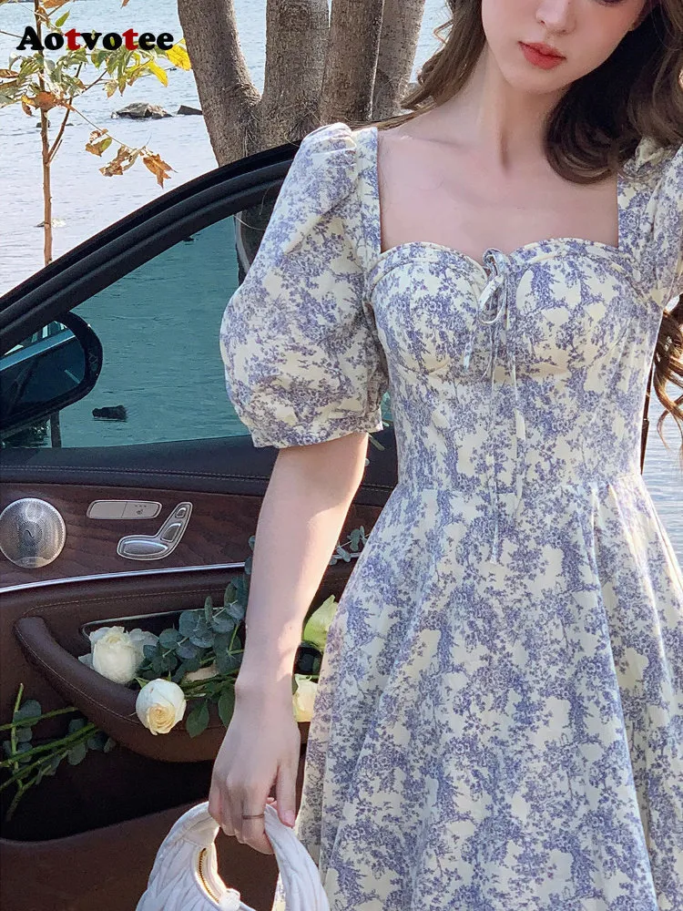 Casual Floral Dress: Elegant French Style with Split Midi and Lace-Up DetailProduct Title: Fashionable Sweet Lace-Up Dress for WomenProduct