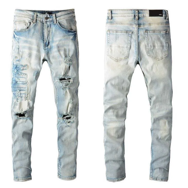 Designer di marca da donna da uomo Jeans viola Pantaloni di jeans di grandi dimensioni Pantaloni traforati Pantaloni con cerniera traforata Hip Hop Pantaloni con lettera Patch slim fit elastici per piedi piccoli Jeans ac