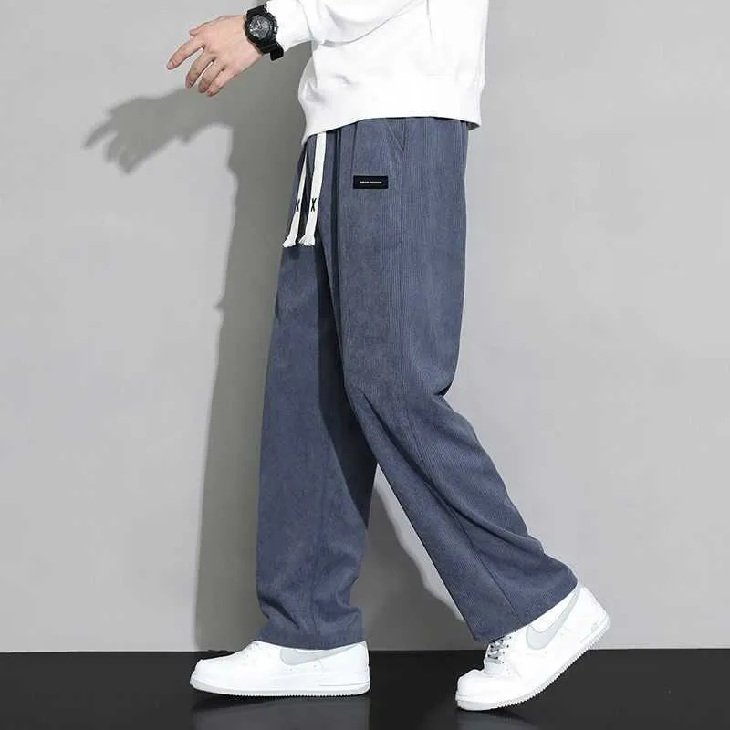 Pantalons pour hommes Printemps automne mode tempérament coréen velours côtelé pantalon à jambes larges homme lâche décontracté couleur unie mâle pantalons de survêtement vêtements de rue W0414