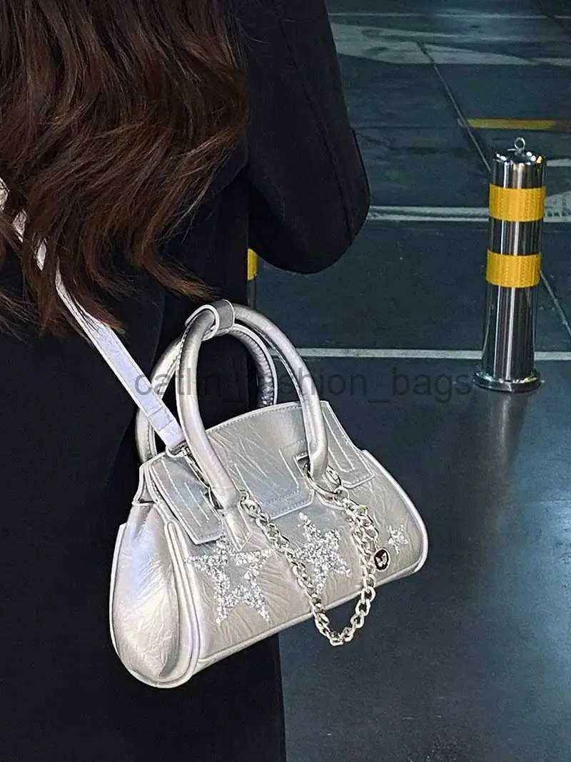 Axelväskor väskor fasion crossbody väska för kvinnor 2023 nya väska med diamantstjärnor bärbar kvinnosäck och andbagscatlin_fashion_bags