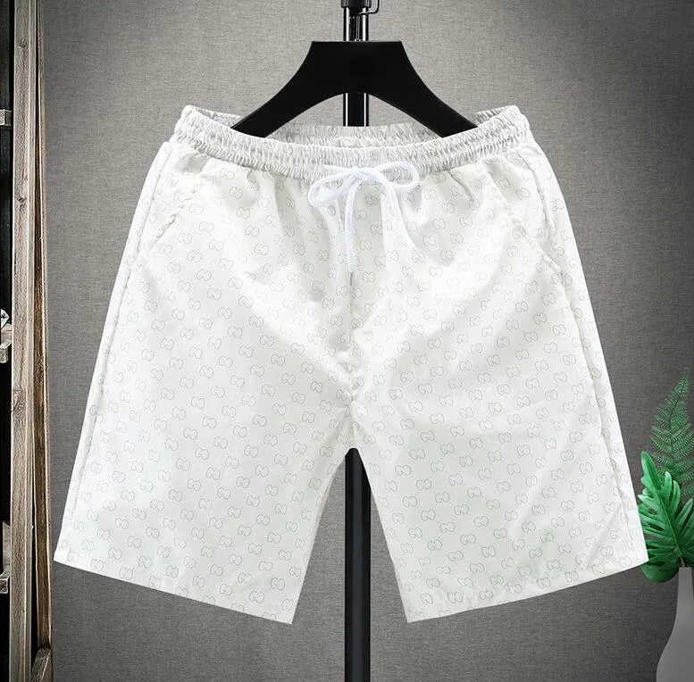 MHF136 Designer Heren shorts Summer Snelle drogende print reflecterende strand shorts
