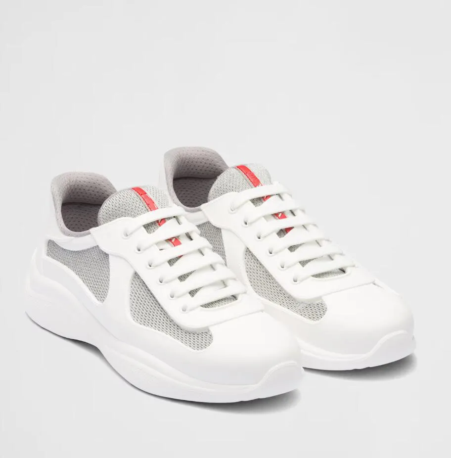 أفضل 23S/S Americas Cup Men Sneakers أحذية تنفس شبكية ناعمة الدراجة المطاطية الشهيرة المدربين الشهير النسيج العجل عجل العجل عارض الأزرق الأسود أبيض الأسود EU38-46