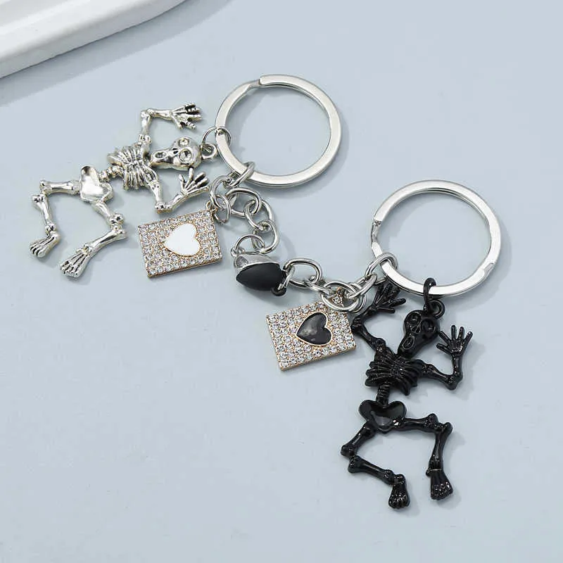 Handmade Punk Skull Keychain With Heart Magnet Pendant Perfect Gift For  Couples And Lovers Fashionable Oreillys Key Fob Accessory AA230411 From  Dafu06, $11.11