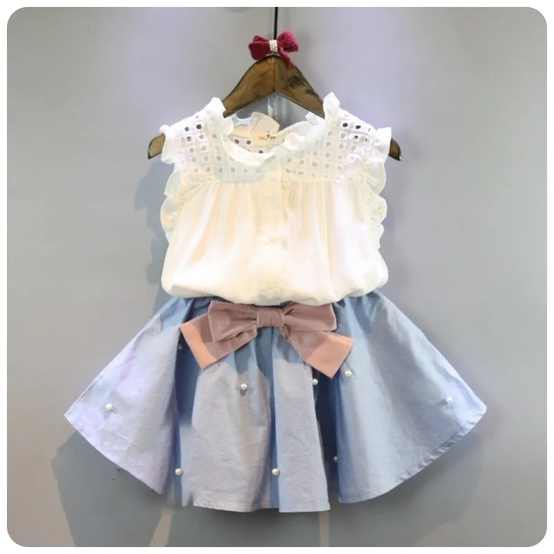 Ensembles de vêtements 2 8 ans Vêtements pour enfants pour filles la jupe d'arc et le costume d'été de la dentelle de style coréen pour bébé pour bébé ensemble 230412