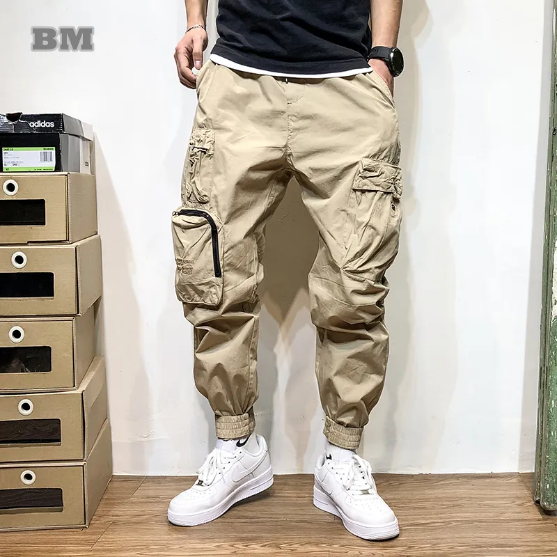 Pantaloni da uomo Abiti da strada giapponesi più pantaloni di merci sottili abiti da uomo Pantaloni da jogging Harajuku pantaloni da jogging casual di moda Corea del Sud pantaloni da jogging kaki 230412