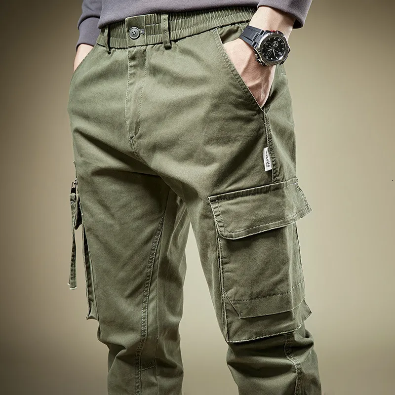 Calça masculina cintura elástica calça de carga masculina jogging algodão bolso de algodão com zíper de calças masculinas Jeans de jeans preto de verão 230412
