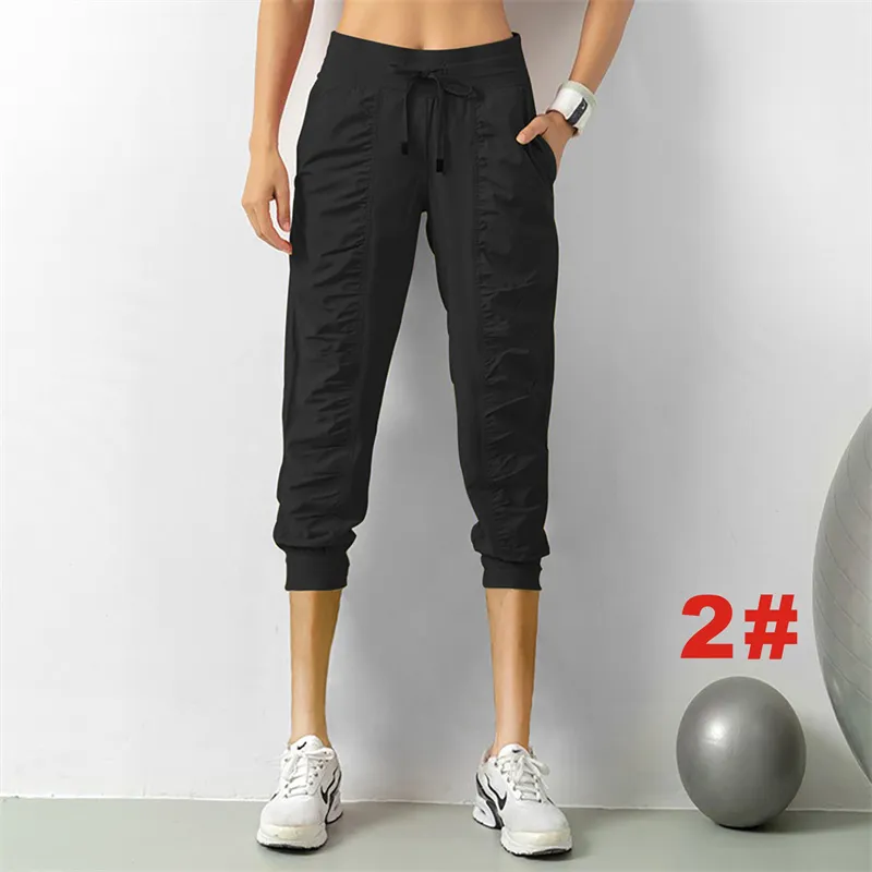 ll kadın joggers brawstring eşofmanları çalıştıran spor hızlı kuru kırpılmış spor salonu fitness pantolon iki yan cep pantolon egzersiz pantolon lu5236