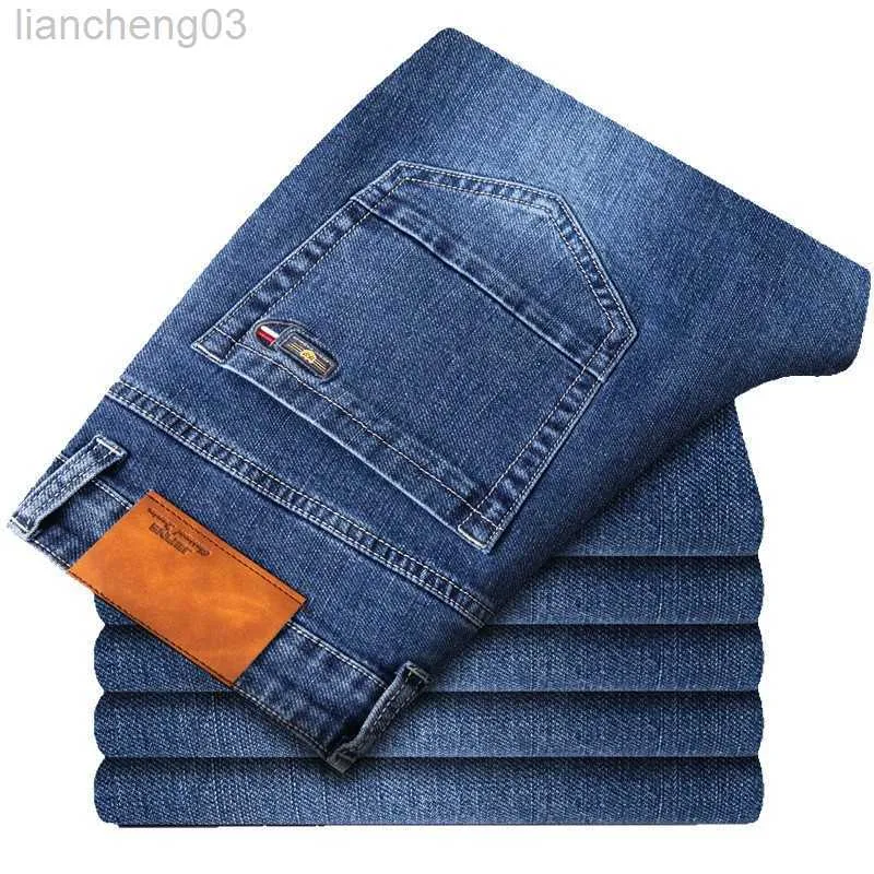 Мужские джинсы Sule Aduumn Новая вулканическая рок -ткань Мужские джинсы классический стиль черный синий джинсовый растяжение W0413