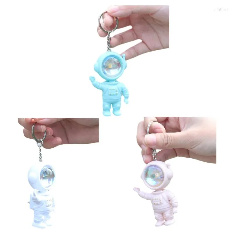 Keychains F19D Astronaut Keychain com o Sunset Projector Light Backpack Charm Pinging