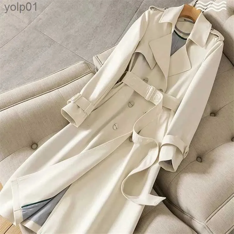 Kvinnors dikerockar Spring Autumn Casual Women Mid-Length Trench Coat med brevbroderier Sashes Double-Breasted Lapel Fe Windbreaker Outwearl231113