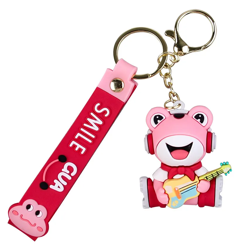 Cartone animato carino musica rana bambola portachiavi suonare la chitarra rana solitaria semplice sacchetto di scuola per auto ornamento ciondolo portachiavi portachiavi W0129