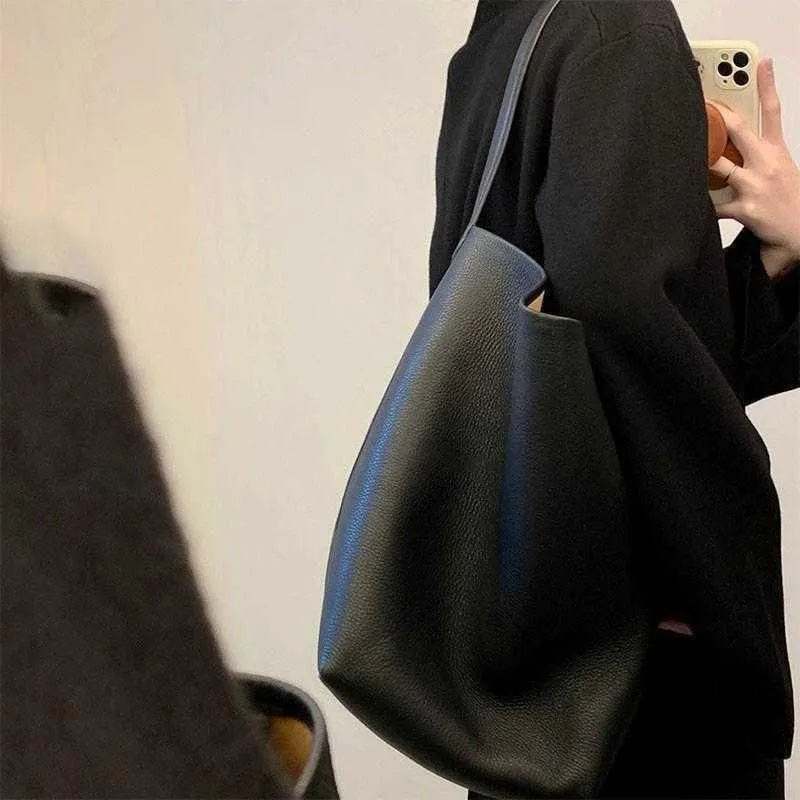 DHgate The Row Bag Bag Best quality Designer Big Bucket Small and Versatile New Tote Handbag Large Capacity Single Shoulder Portable Real Leather Handbag French Minority Bags Luggage Accessories