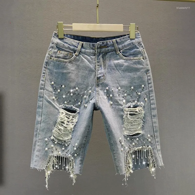 Kvinnors jeans 2023 Spring Loose High midjan Slantning Kort sommar Kvinnor Tärbror Rhinestone Tassel Rippad knälängd Shorts Felmale