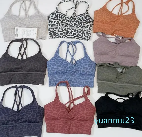 Completo da yoga antiurto stampato leopardato fitness reggiseno sportivo incrociato canotta da allenamento con imbottitura sul petto