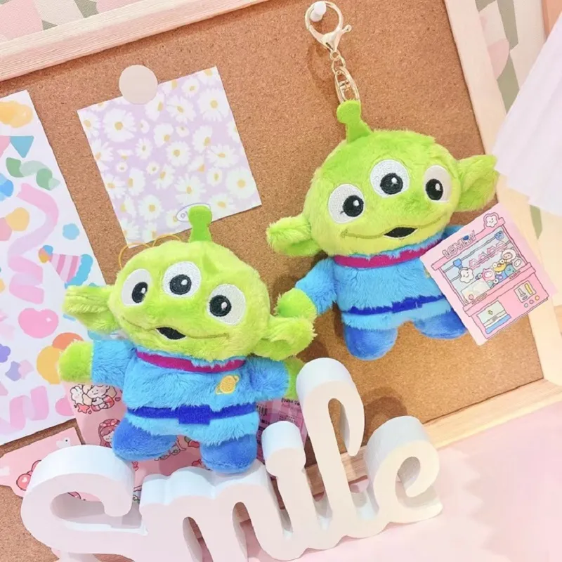 Manufacturers wholesale 12cm three-eyed plush key chain toys cartoon film and television peripheral dolls children gifts