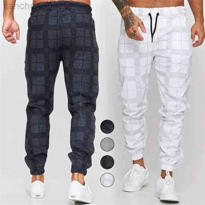 Pantalons pour hommes Pantalons décontractés à carreaux pour hommes New Plaid Striped Drawstring Jogger Pants for Men Business Casual Pencil Pant Male Clothes Vintage W0414