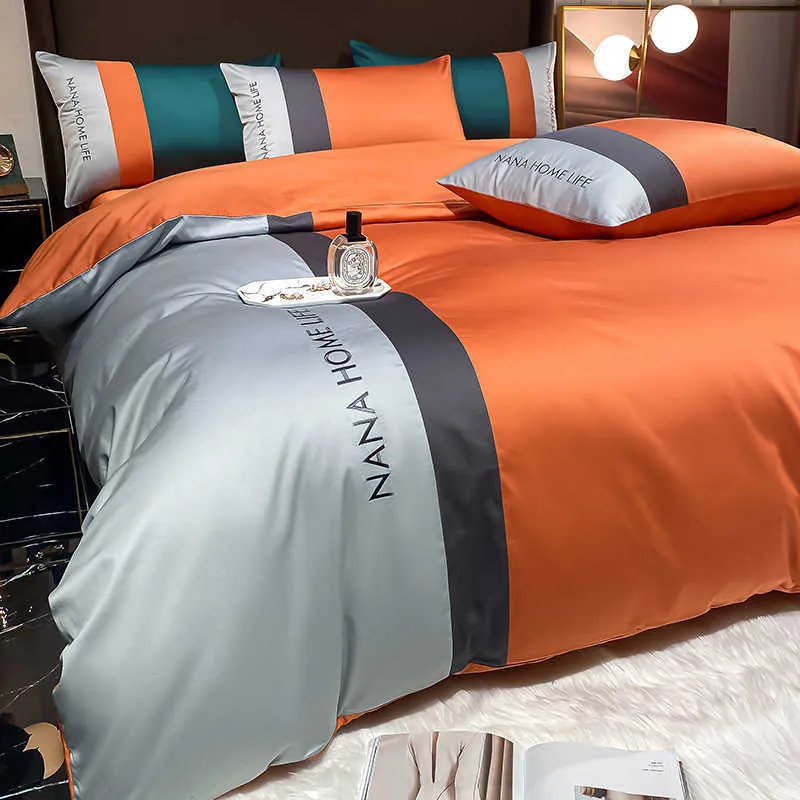 Lüks yatak seti stil yüksek uç ışık lüks dört parçalı set düz renkli pamuk lüks moda markası üç parçalı set yorgan kapağı