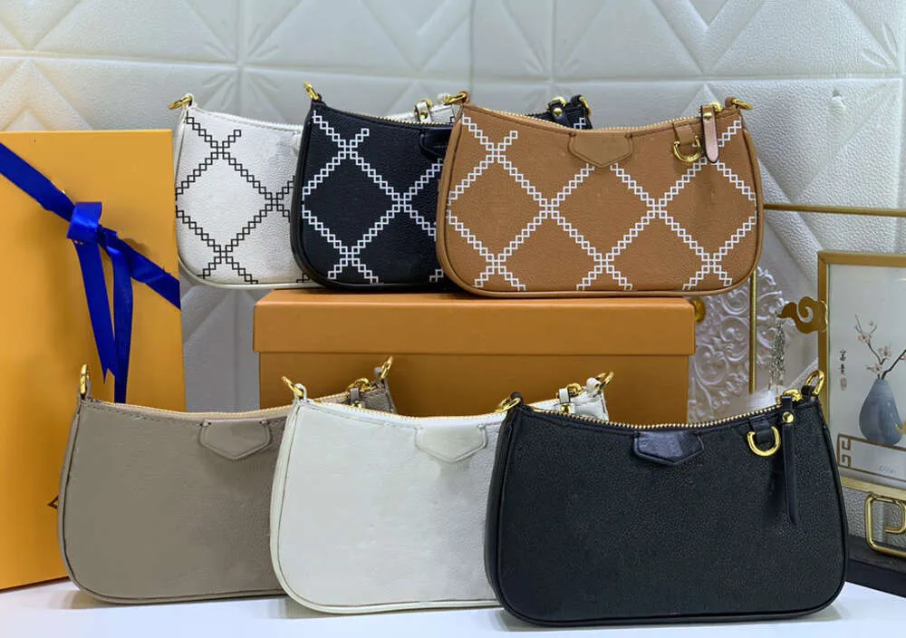 Origina Monogramas de alta qualidade em relevo Bolsa fácil na alça Bolsa Bolsa feminina Bolsas mensageiro Ondulações de água Tote Pochette Corrente Moda Bolsas de ombro clássicas