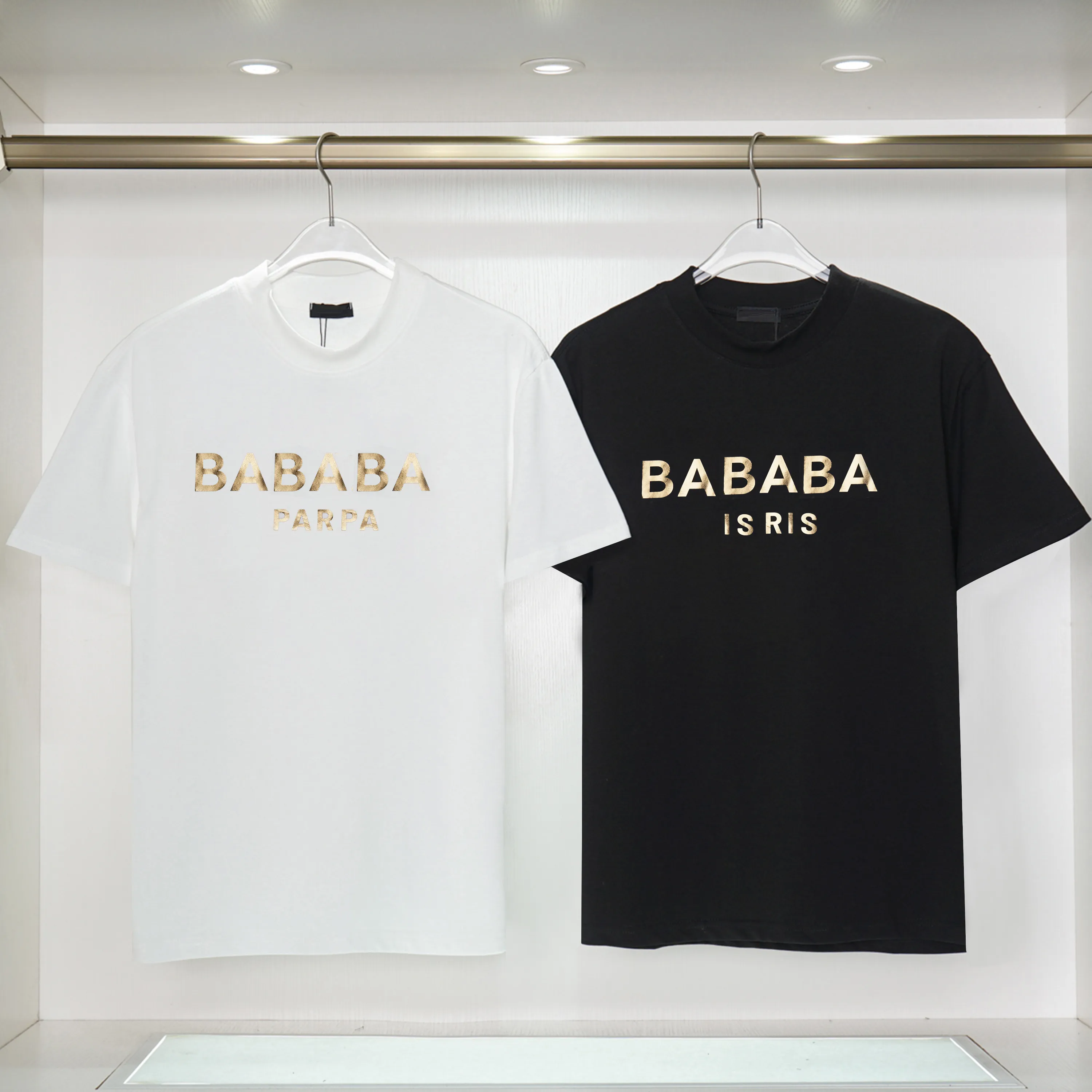 メンズデザイナーの衣服有名なTシャツレタープリントラウンドネック半袖の黒と白のファッショナブルな男性と女性のTシャツ卸売ブランド衣類3xl