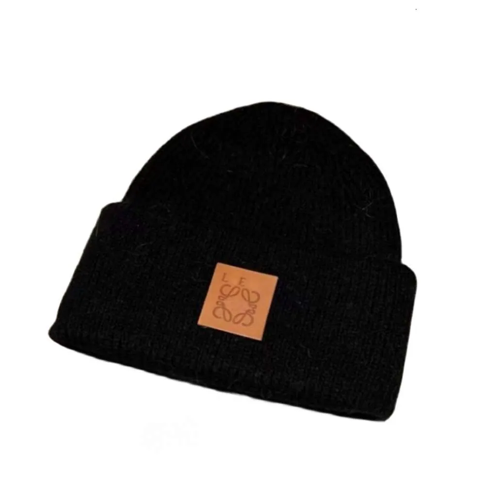 Gorro Diseñador Lujo Invierno Sombrero de punto Cálido Protección para los oídos Moda Moda Gorra al aire libre Temperamento Clásico Color sólido Letra Gorro