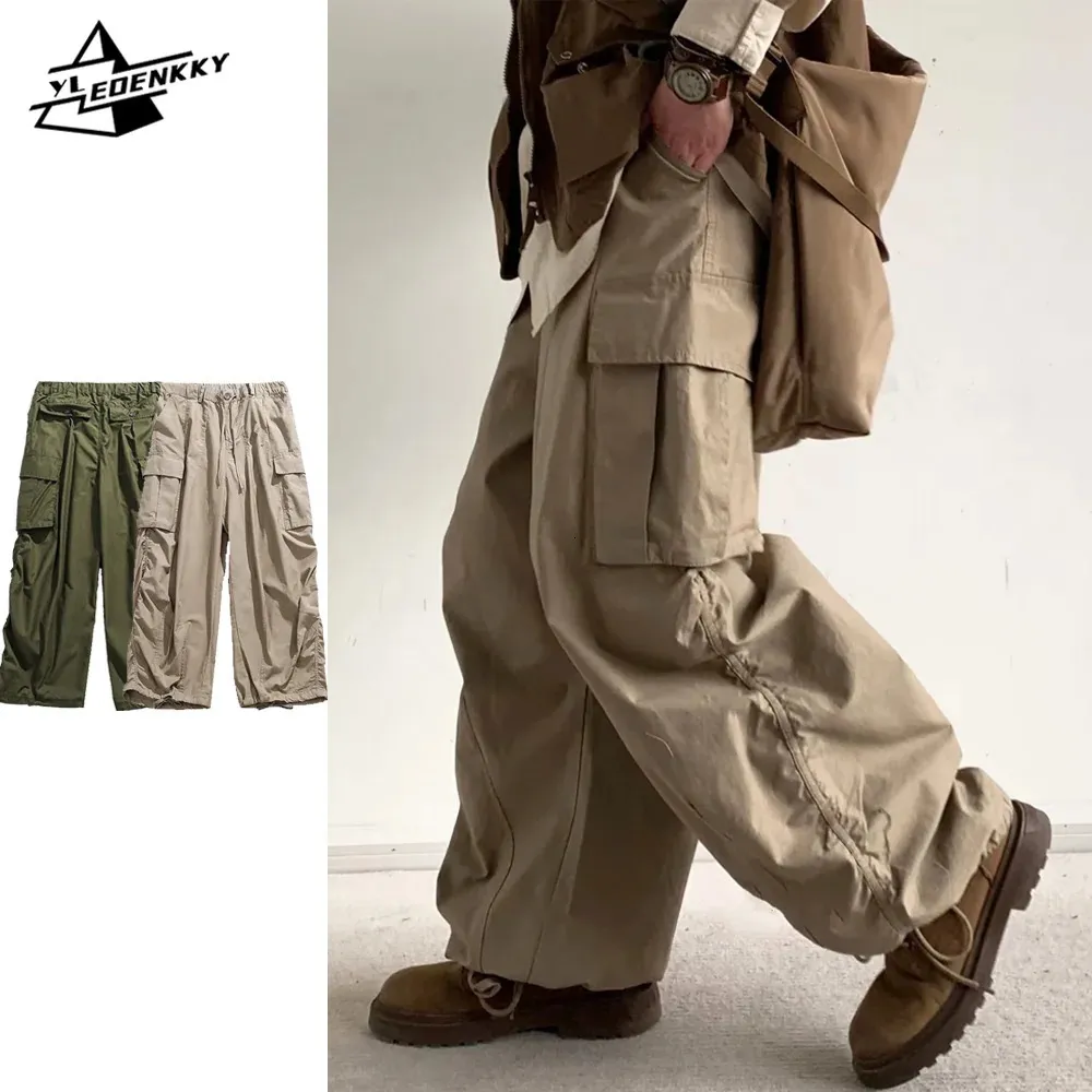 Pantalons pour hommes Harajuku Cargo Hommes Femmes Vintage Multi Poche Pantalon large Street Hip Hop Casual Baggy Printemps Automne Unisexe 231114