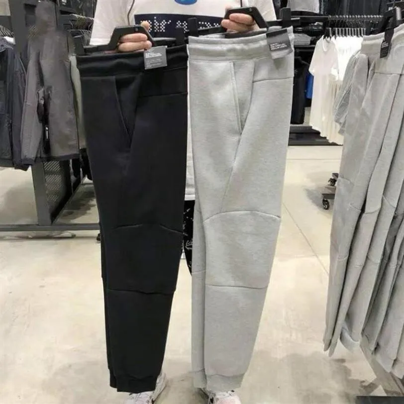 Pantaloni sportivi in pile tecnico stile americano europeo Pantaloni in cotone spaziale Pantaloni da tuta da uomo Pantaloni da jogging da uomo Tech Fleece Camo Running 235S