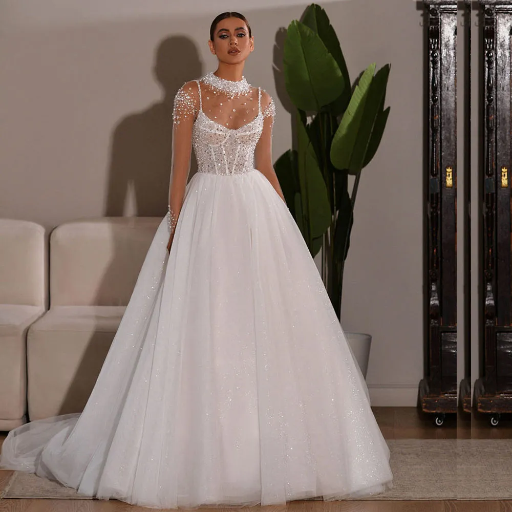 Błyszcząca koralikowa szyja liniowa sukienka ślubna suknie ślubne siatka z długim rękawem cekinowa top vestidos de novia na ślub