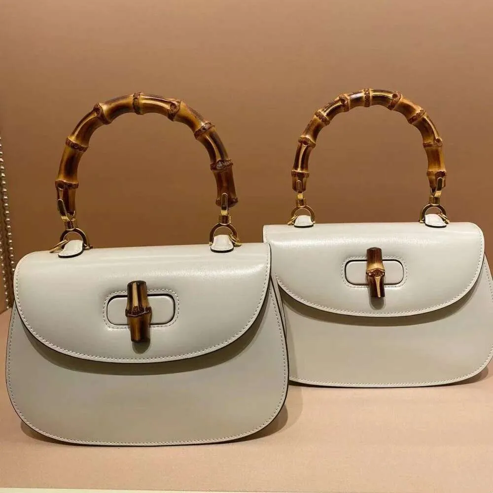 DHgate.com:Designer bags Saddle bag bamboo joint bag genuine