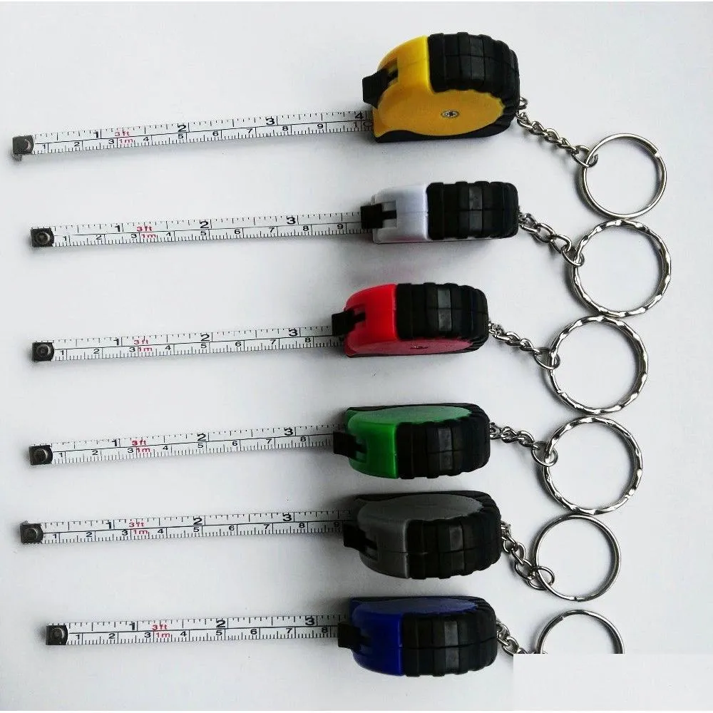 Maßbänder Großhandel Mini-Maßband mit Schlüsselanhänger Kunststoff tragbar 1 m einziehbar RER Zentimeter/Zoll Drop Delivery Office Scho Dhjgu