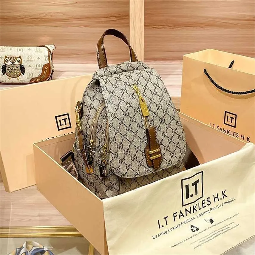 حقيبة 22 ٪ من المصمم حقيبة يد هونغ كونغ العداد الحقيقي للجلد الجديد أزياء جديدة هذا العام حقيبة سعة كبيرة سعة سعة على ظهرها للنساء