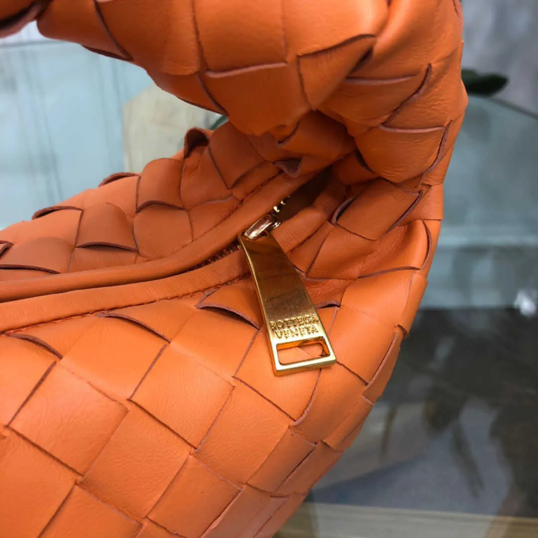 Designer women`s bag B`s orange cowhide knotted Hobo bag! Lightweight Weaving Popular Light Luxury Retro Geometry