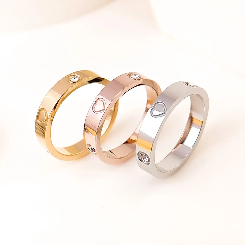Anéis para mulheres banhado a ouro delicado jóias homens 18k anéis de aço de titânio acessórios de designer de luxo moda casal diamante anel de ouro presente xg2313