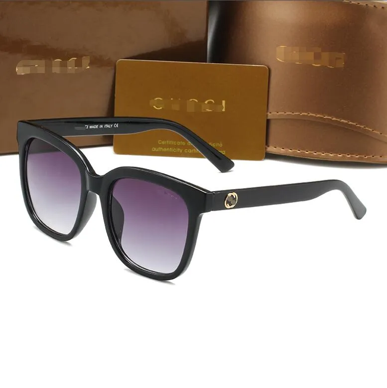 Gafas de sol redondas de moda Gafas Gafas de sol Marca de diseñador Marco de metal negro Lentes de vidrio para hombres Mujeres Mejores casos marrones G0034s