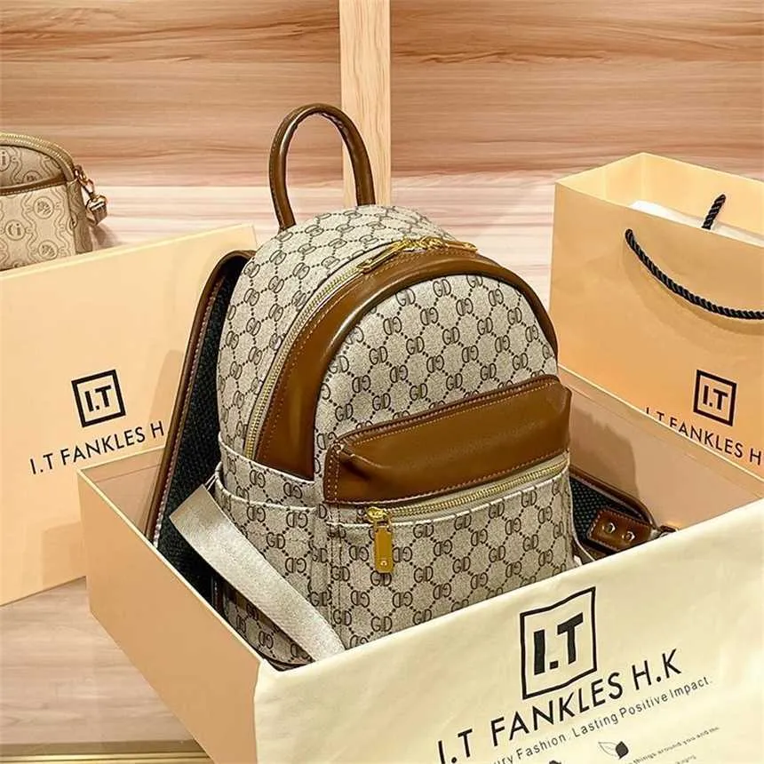 Väska 26% rabatt designer handväska Hong Kong inköpsagent äkta läder nytt populärt i år mångsidig resependling ryggsäck för kvinnor