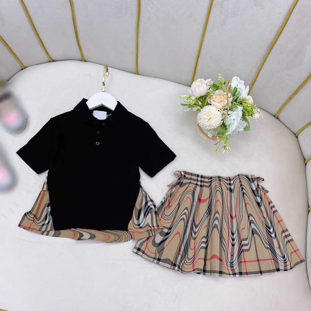 23ss set per bambini set di gonne per bambini abiti firmati ragazze cuciture a quadri polo maniche corte gonna a pieghe mezze gonne vestito vestiti per bambini di alta qualità