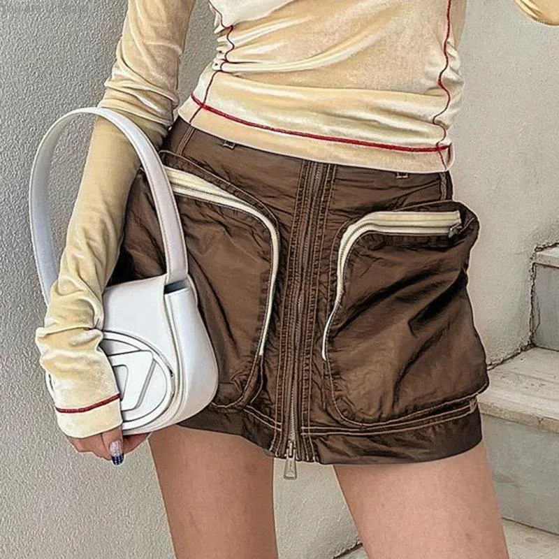 スカート2023夏の女性のドレスソリッドカラーハイウエストスリムフィット大きなポケットジッパートレンディワーク服ミニスカート