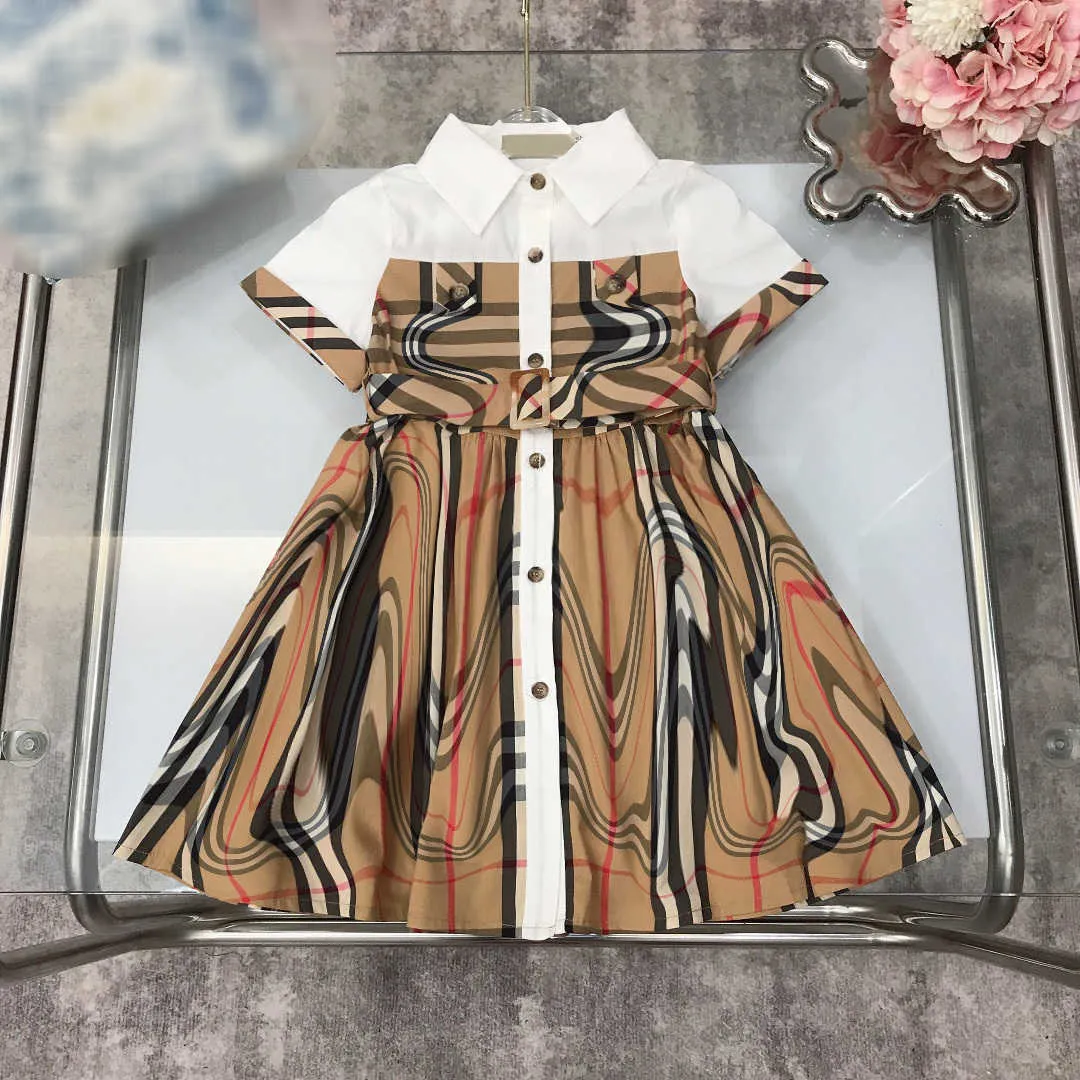 Vestidos de menina 23sss Princess Dress Dress Sleeved meninas de mangas curtas Roupas de designer roupas lapela Lattice Splicing Belt Shirtdress Big Shirt Saias