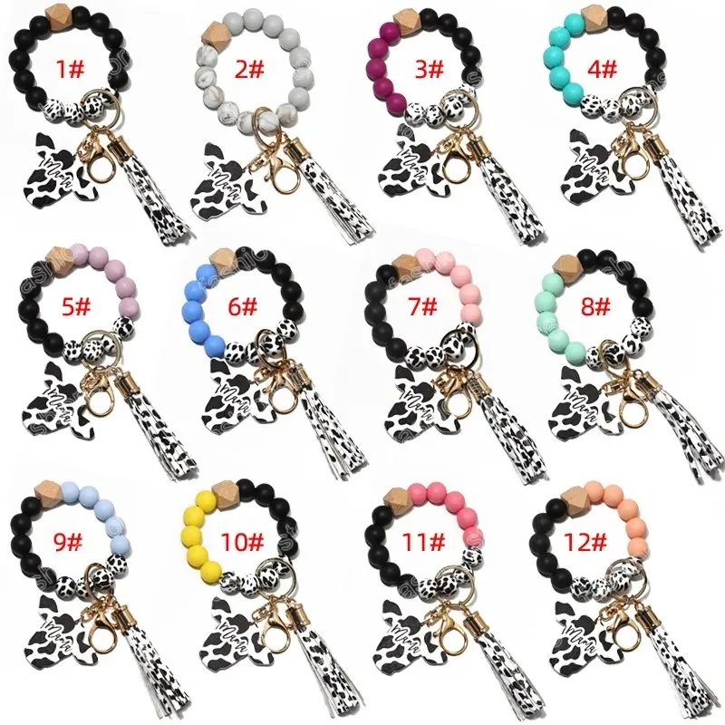 Koe sleutelhangers aangepaste siliconen kralen lederen kwastje schattige koe houten stier houten kralen armband siliconen polsslijnsleutelhanger met mom print