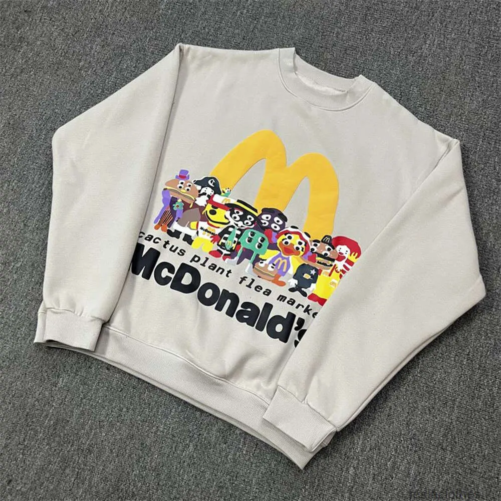 Sweat à capuche de créateur Sweatshirts pour hommes Mode Streetwear Cpfm x Mcdonald's Co Br ed Famille Photo Mousse Dessin animé Imprimer Ajustement ample Pull à col rond en peluche pour hommes et femmes