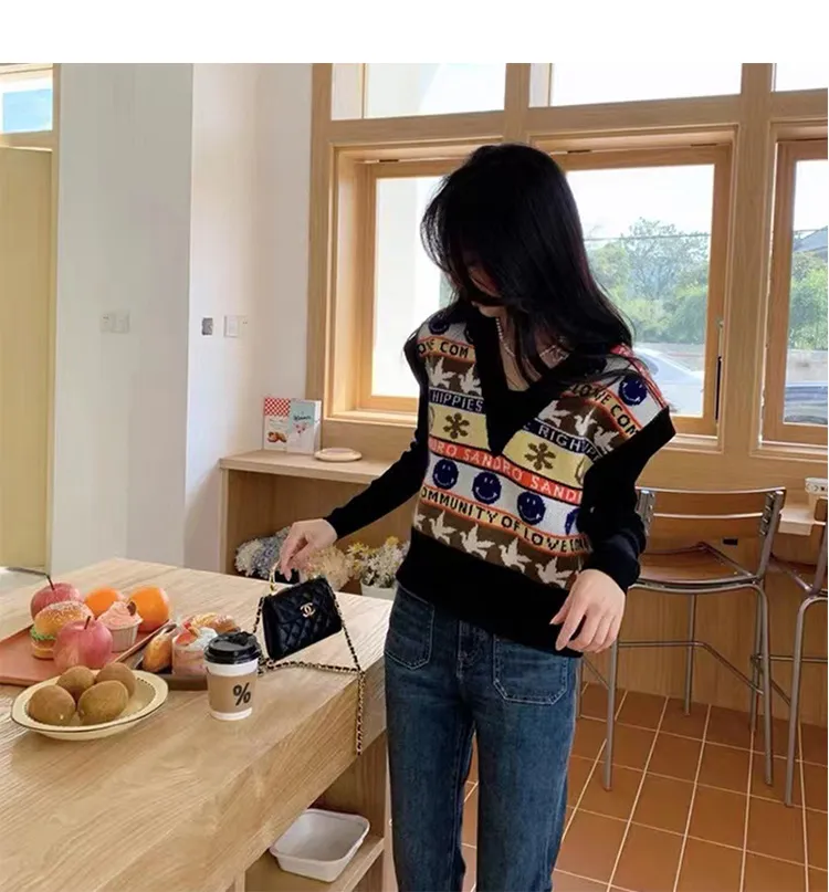 Pull jacquard sans manche sale