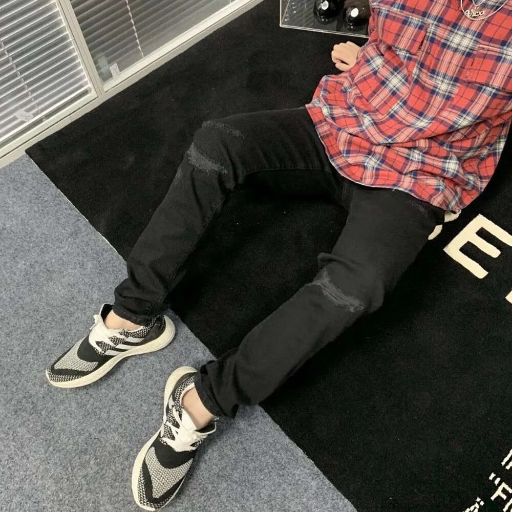 デザイナーカジュアルパンツメンズズボンスウェットパンツは、苦しんでいるハイストリートジーンズの男の子のカジュアルパンツファッションbrスリムフィット小さな足を表しています