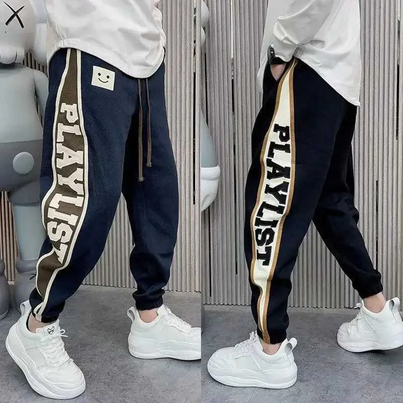 Herrbyxor lösa jogger sweatpants brev tryck mode hip hop streetwear koreansk stil byxor nya lyxmärke herrkläder j231116