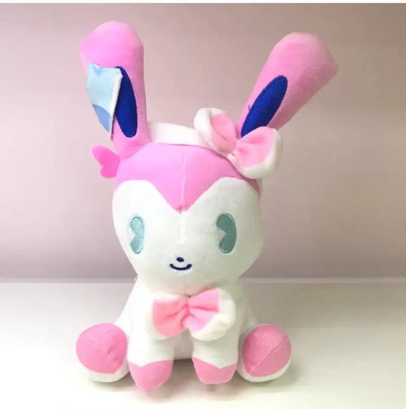 Manufacturers wholesale 10 styles of 20cm Bikachu Ibu plush toys cartoon film and television peripheral dolls for children's gifts