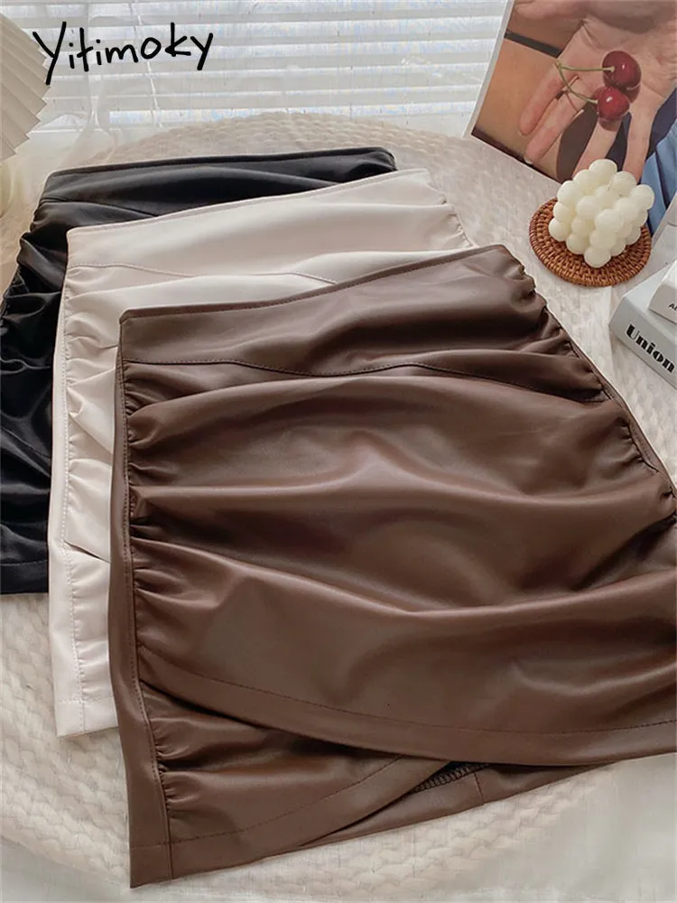Spódnice YiTimoky skórzane spódnice Kobiety Krzyżowe fałdy pu mini czarna spódnica jesień koreańska moda swobodna kawa gotycka spódnice z podszewką 230417