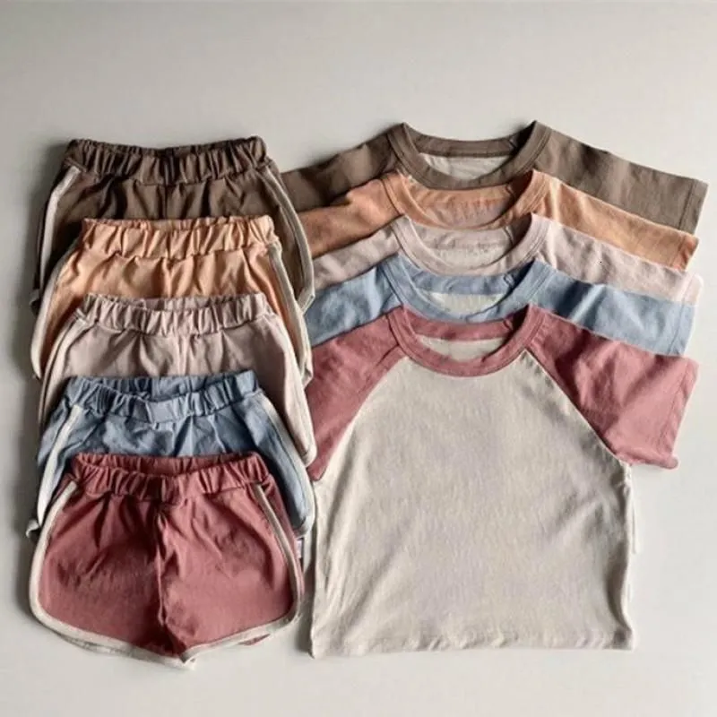 Kledingsets zomer peuter babykleding set katoenpatchwork kort mouw t -shirt shorts 2 stks passen kinderen jongens meisjes casual kleding 230417