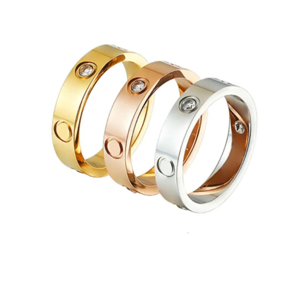 Anel de designer de luxo banhado a ouro mulheres homens emoção pesada amor anel jóias de casamento titânio aço personalizado simples casal noivado moda anéis de diamante de prata