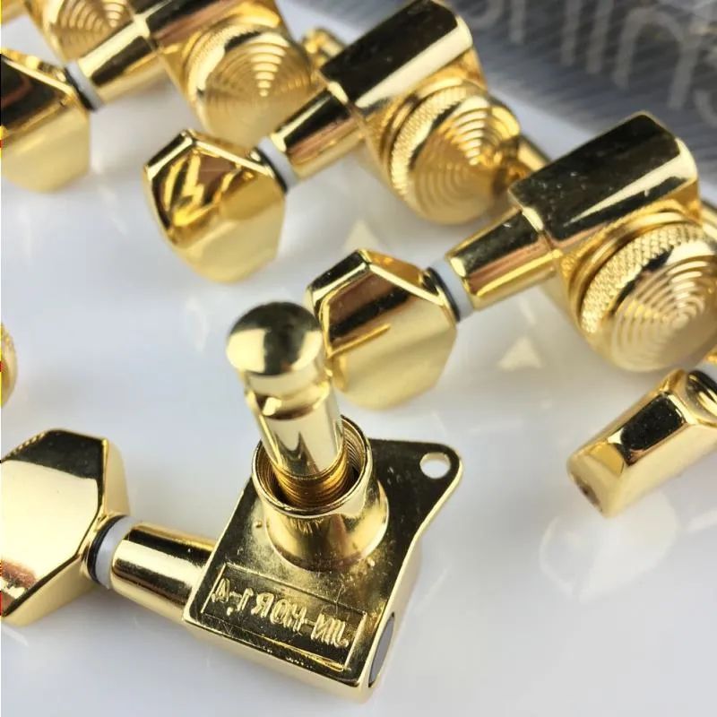 Freeshipping nya guldgitarrlåsning av tuners Electric Guitar Machine Heads Tuners JN-07SP Lock Tuning Pinns (med förpackning) CCUPS
