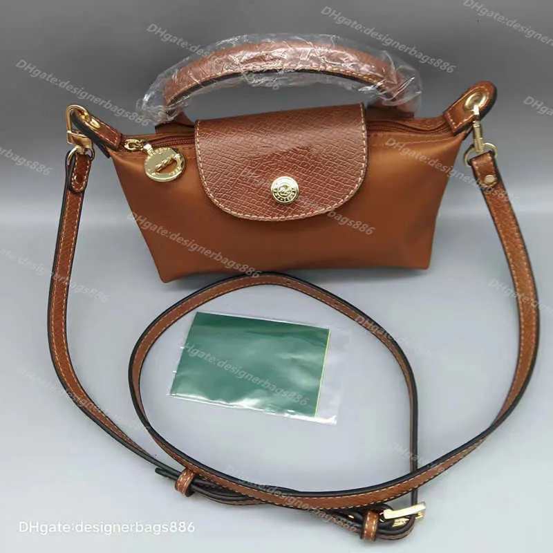 High quality Clearance Wholesale wallet Nylon Dumpling Bag %95 Off Wholesale sac 2024 Short Handle Hand Contrast Cosmetic Cognac Color Hand Mini handbag