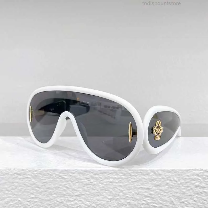 Designers solglasögon lyxiga solglasögon personlighet uv resistenta glasögon populära män kvinnor för glasögon ram vintage metallglas med låda