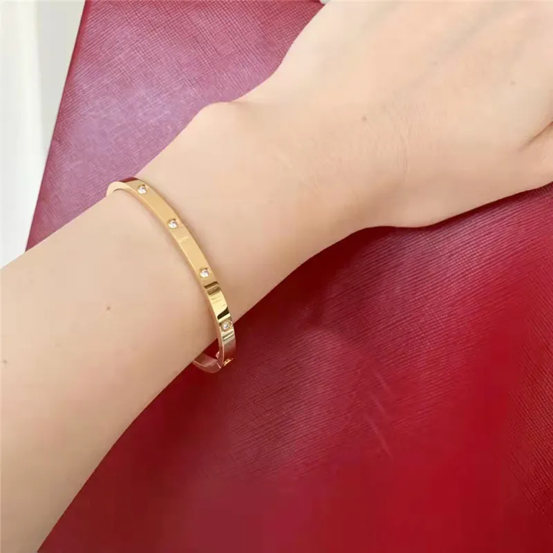 Top Highquality Fashion Gold Bogle Bransoletka stalowa Bracelety Słynne luksusowe projektanci marka biżuteria Kobiety para śruba miłość